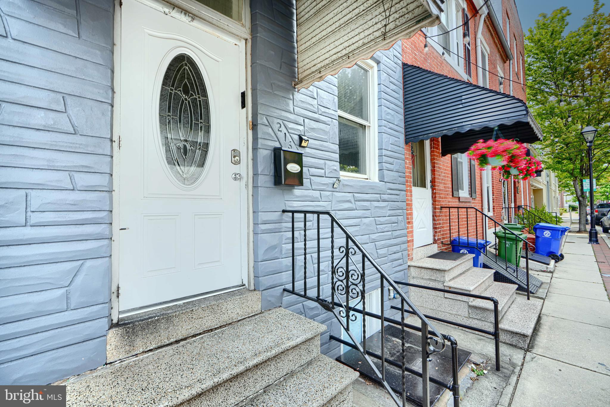 216 South High Street Baltimore, MD 21202 - Photo 2 of 25 a view of a patio with couple of flower plants