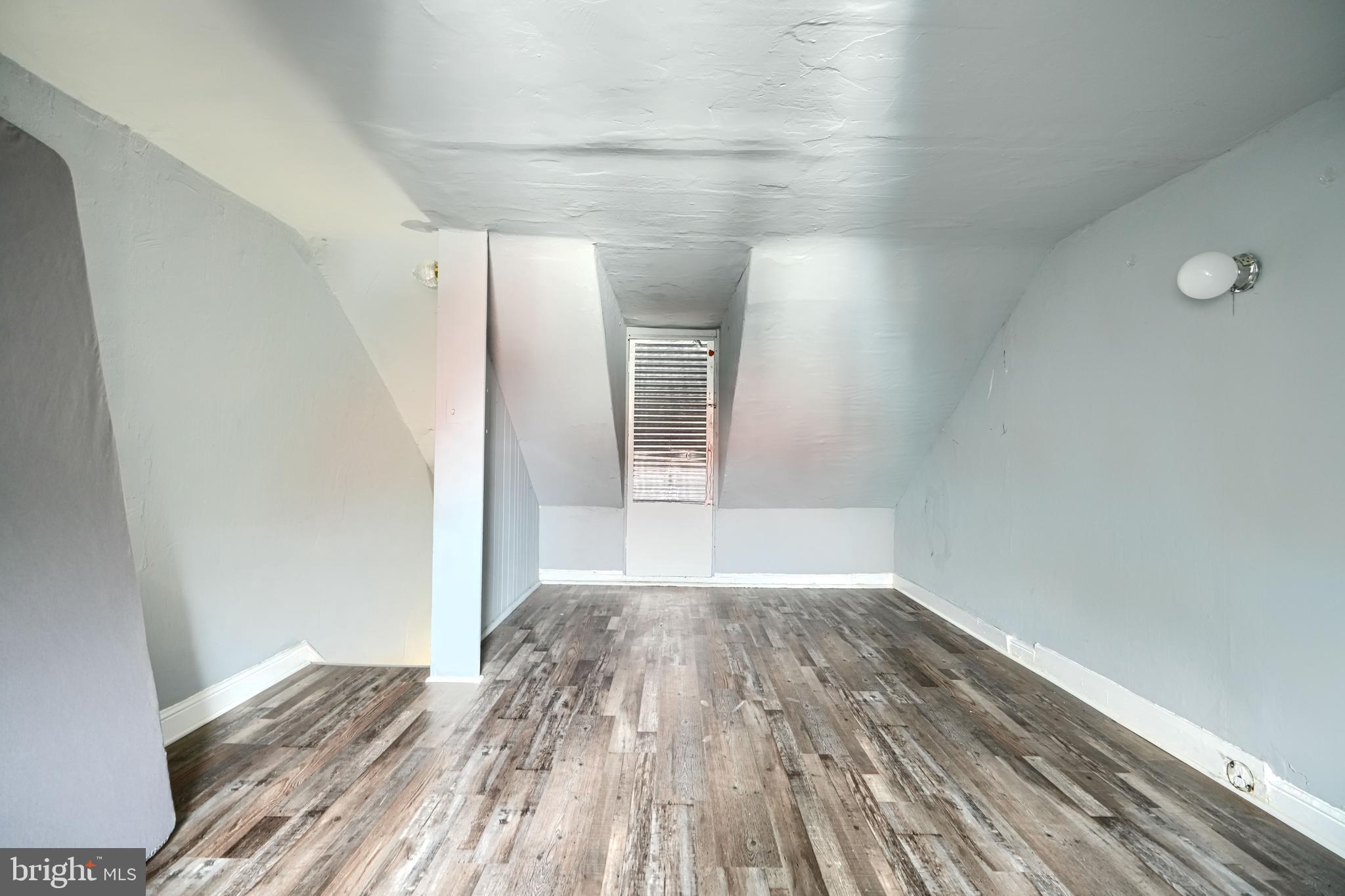 216 South High Street Baltimore, MD 21202 - Photo 21 of 25 a view of hallway with wooden floor