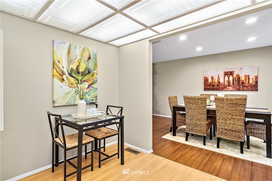 15713 Southeast 148th Street Renton, WA 98059 - Photo 16 of 39 a dining room with furniture and window