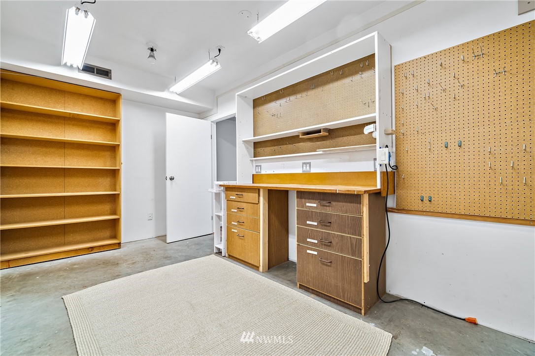 15713 Southeast 148th Street Renton, WA 98059 - Photo 28 of 39 a room with storage and utility