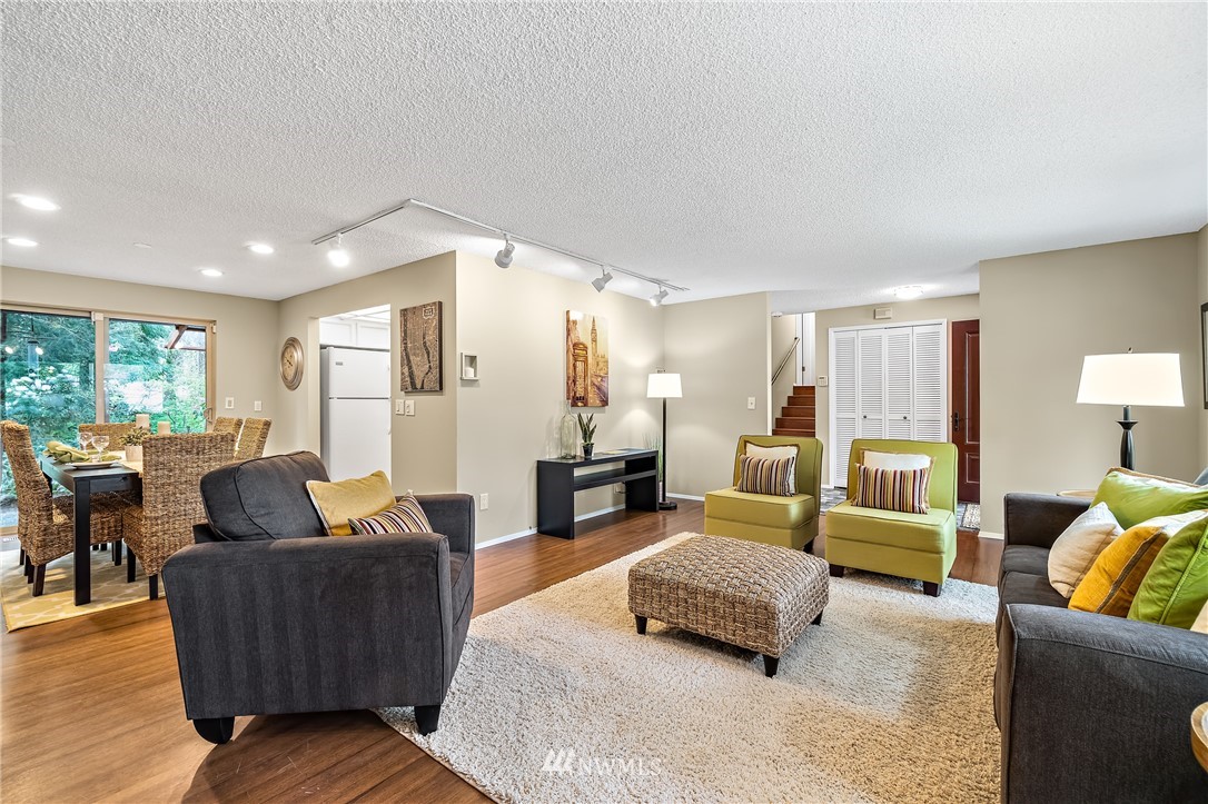 15713 Southeast 148th Street Renton, WA 98059 - Photo 10 of 39 a large bedroom with furniture and a large window