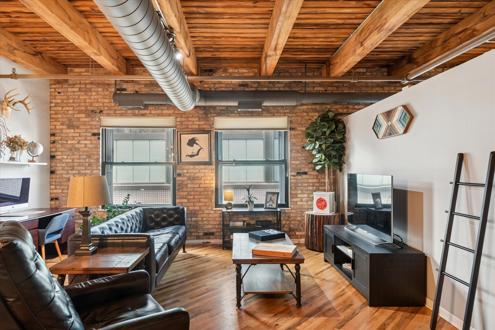 225 West Huron Street, Unit 516 Chicago, IL 60654 - Photo 5 of 20 a outdoor living space with patio furniture