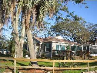 422 Labree Road Pensacola, FL 32507 - Photo 1 of 4 front view of a house with a yard