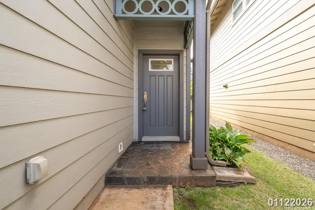 a view of house with backyard