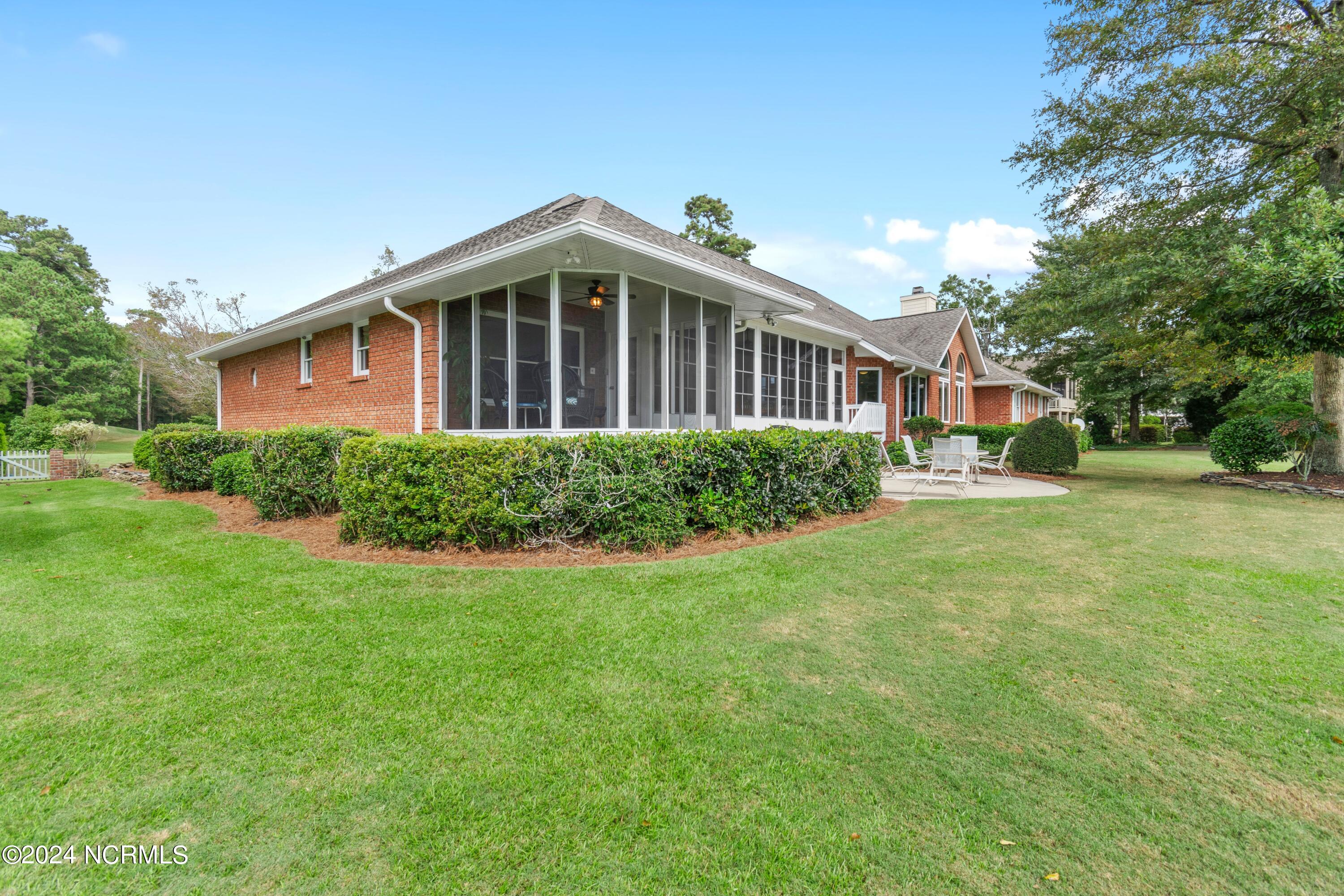181 Rice Mill Circle Sunset Beach, NC 28468 - Photo 63 of 87 Screened porch exterior