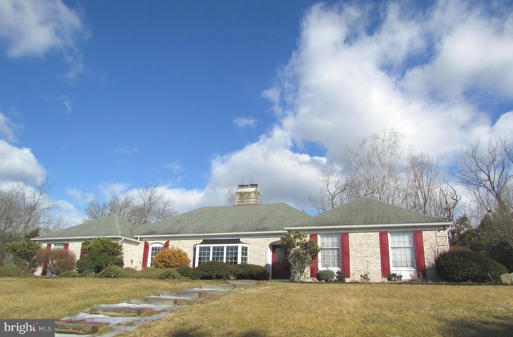 Stately 4 Bedroom and 3 Bathroom Brick Ranch