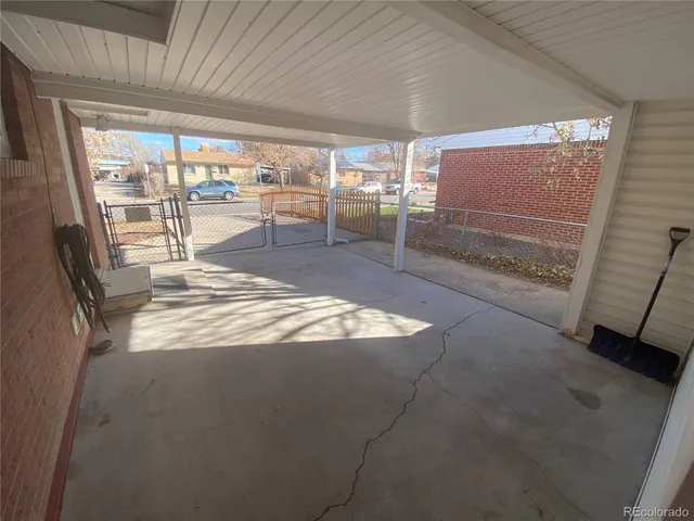 a view of a backyard of the house