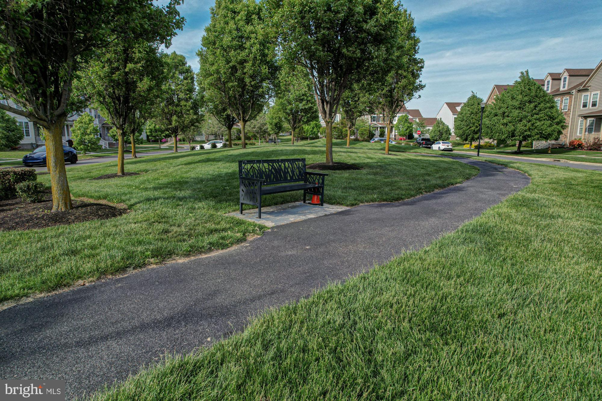 1805 North Pollock Way Middletown, DE 19709 - Photo 13 of 84 Tranquil park path with seating