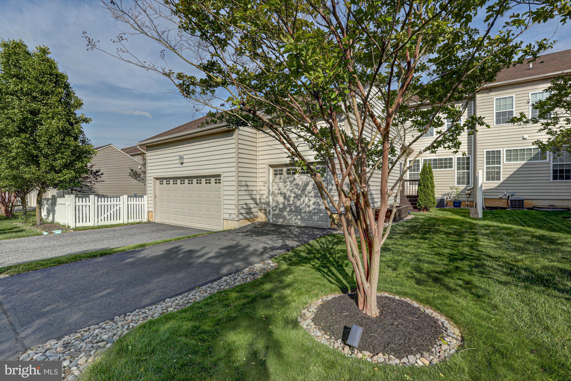 1805 North Pollock Way Middletown, DE 19709 - Photo 21 of 84 Charming curb appeal with lush greenery.