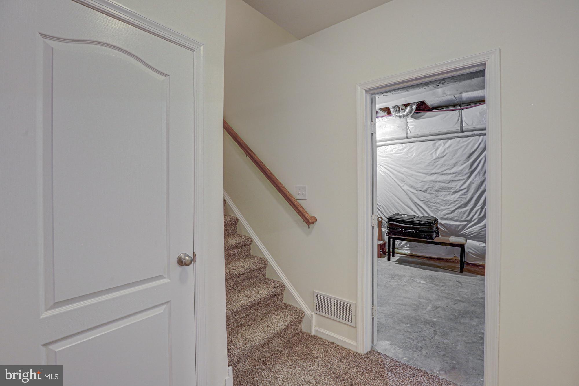 1805 North Pollock Way Middletown, DE 19709 - Photo 63 of 84 Inviting entryway with staircase charm.