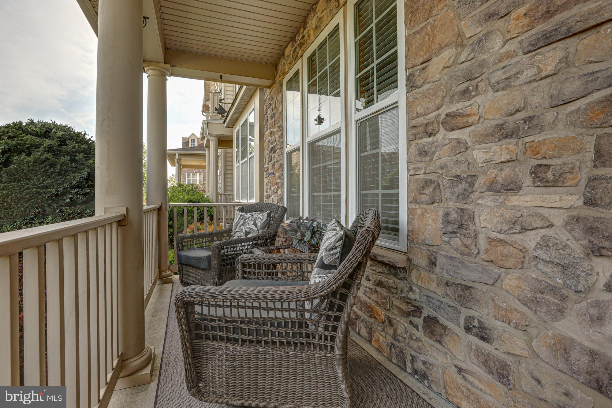 1805 North Pollock Way Middletown, DE 19709 - Photo 9 of 84 Charming stone porch with cozy seating.