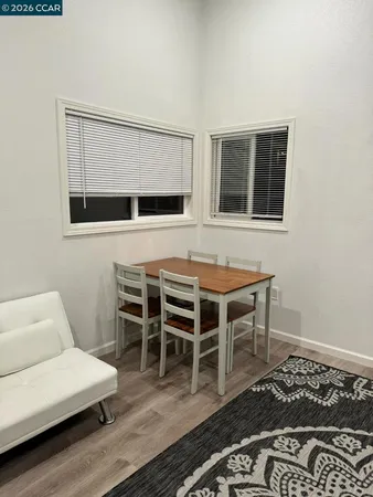 a living room with a rug