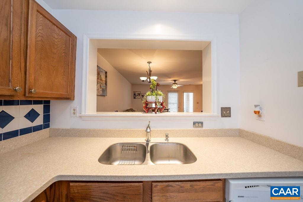 1302 Wimbledon Way Charlottesville, VA 22901 - Photo 13 of 60 a bathroom with a sink and a mirror