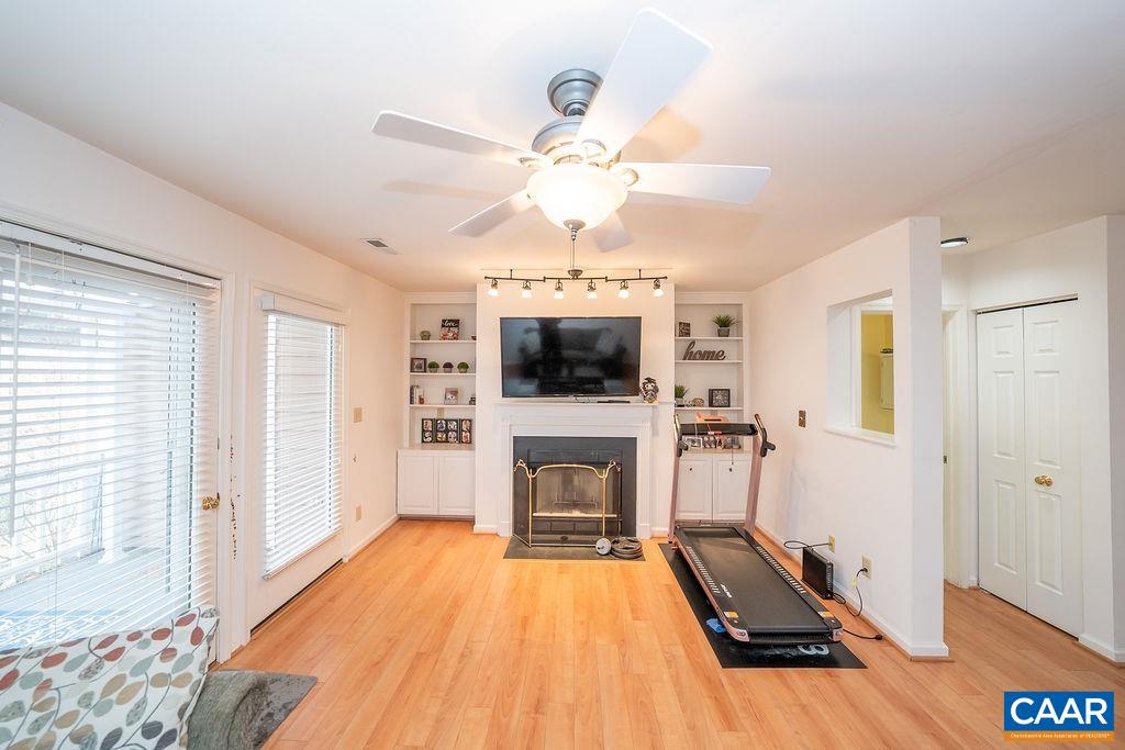 1302 Wimbledon Way Charlottesville, VA 22901 - Photo 18 of 60 a living room with furniture and a flat screen tv