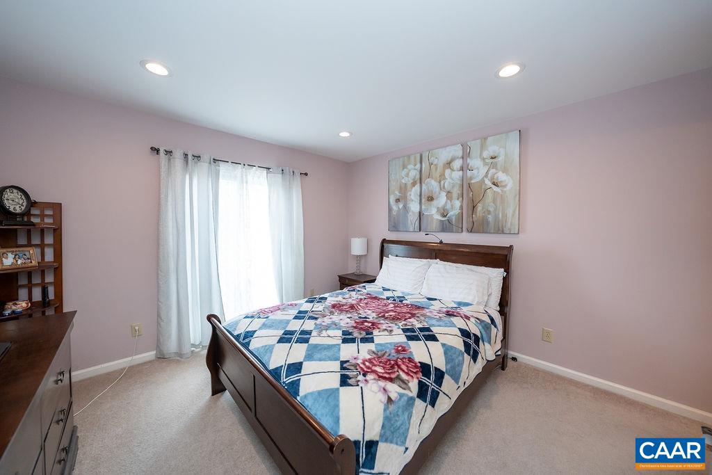 1302 Wimbledon Way Charlottesville, VA 22901 - Photo 32 of 60 a bedroom with a bed and a window