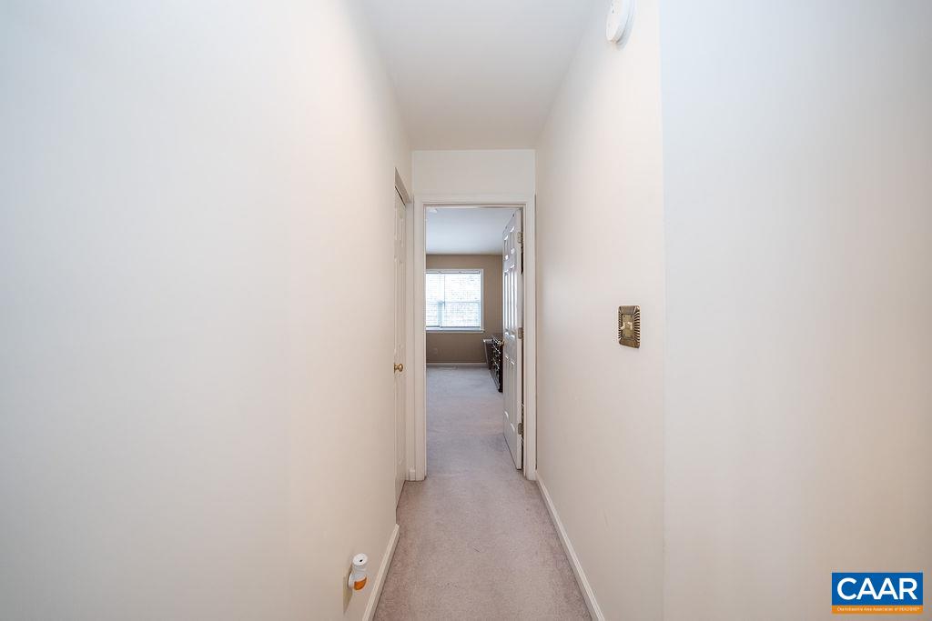 1302 Wimbledon Way Charlottesville, VA 22901 - Photo 37 of 60 a view of a hallway with a white walls