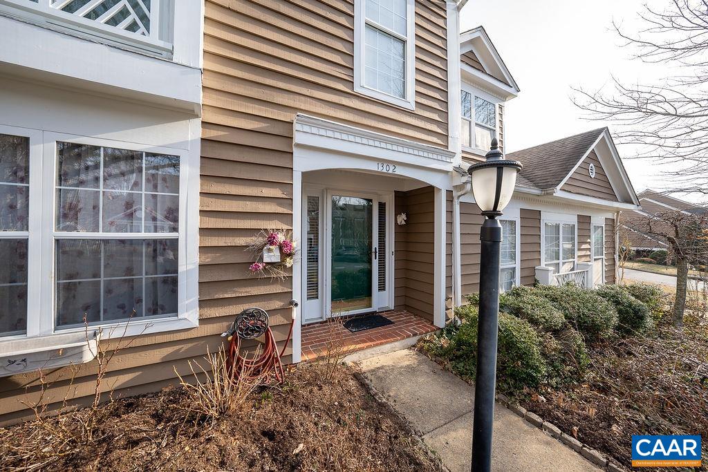 1302 Wimbledon Way Charlottesville, VA 22901 - Photo 51 of 60 a front view of a house with a large window