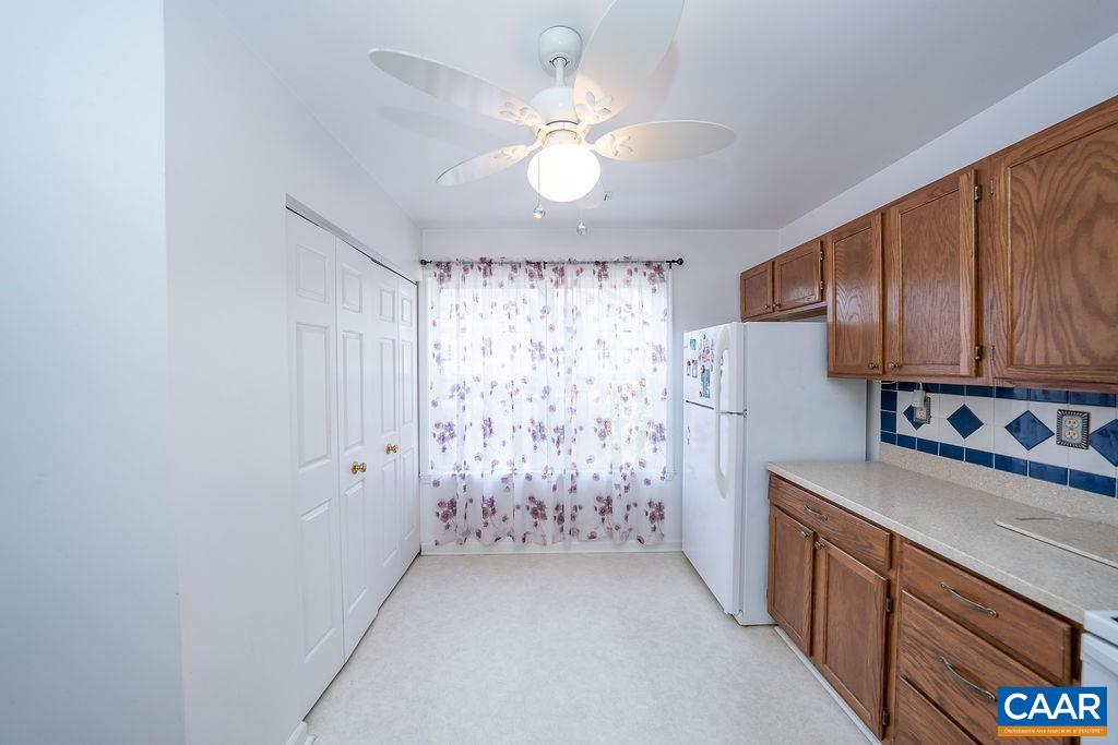 1302 Wimbledon Way Charlottesville, VA 22901 - Photo 10 of 60 a kitchen with stainless steel appliances a refrigerator and a stove top oven