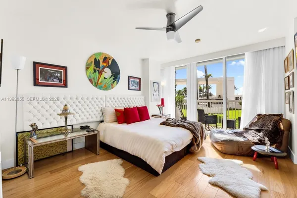 a bedroom with a bed and a couch