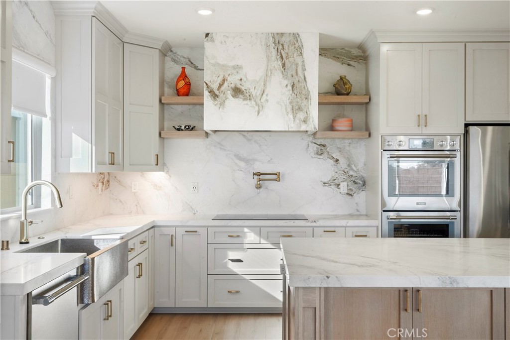 19795 Beavertail Way Riverside, CA 92508 - Photo 1 of 39 Brizo brushed nickel SmartTouch faucet and wall-mounted pot filler