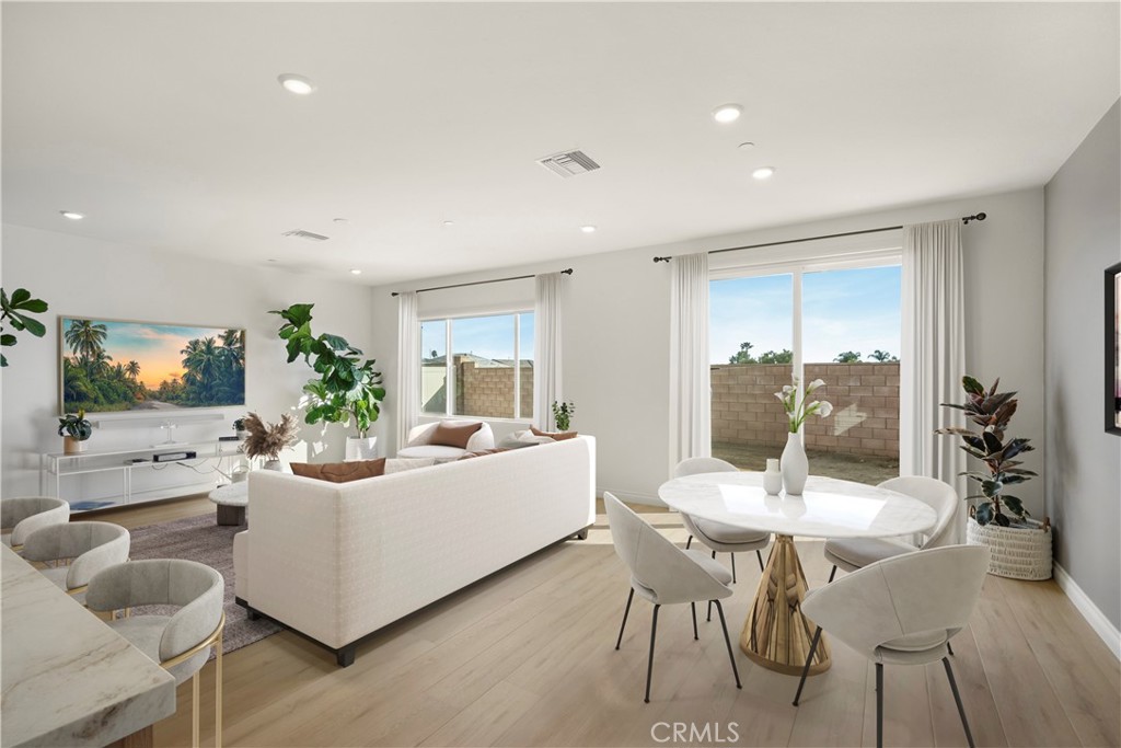 19795 Beavertail Way Riverside, CA 92508 - Photo 14 of 39 Dining Room and Family Room - Virtually Staged