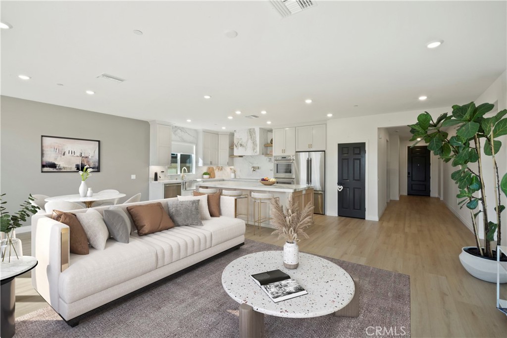 19795 Beavertail Way Riverside, CA 92508 - Photo 16 of 39 Family Room and Dining Area - Virtually Staged.