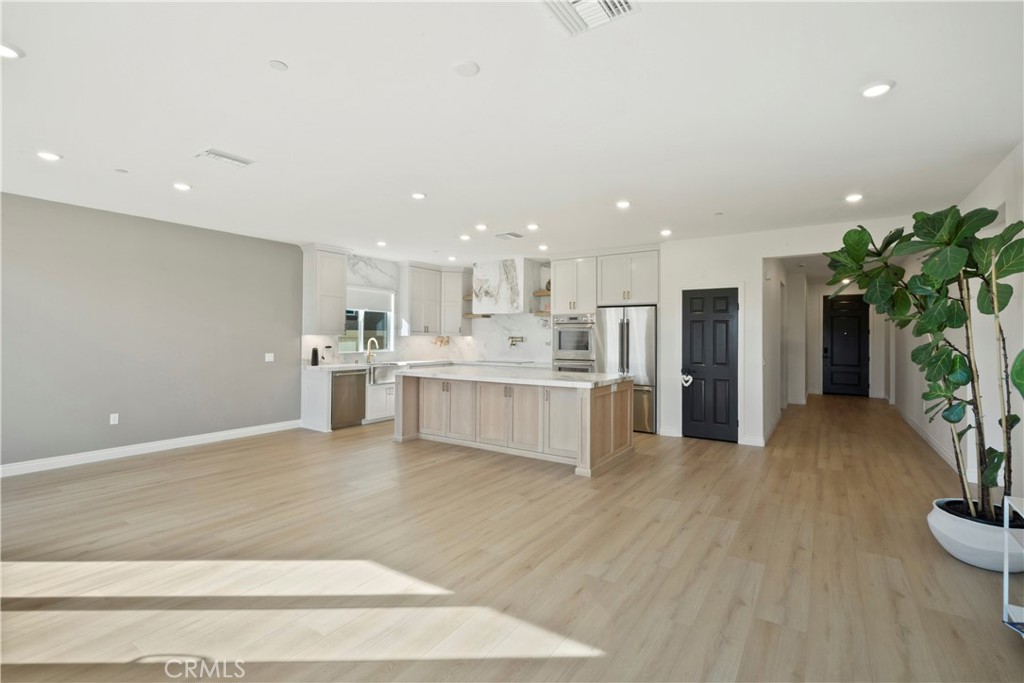 19795 Beavertail Way Riverside, CA 92508 - Photo 17 of 39 Family Room and Dining Area
