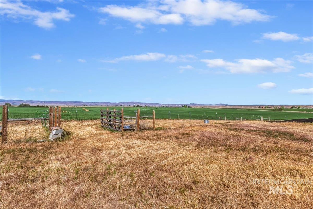 2331 Gulley Road Homedale, ID 83628 - Photo 45 of 46 Expansive agricultural land featuring a verdant field and distant hills