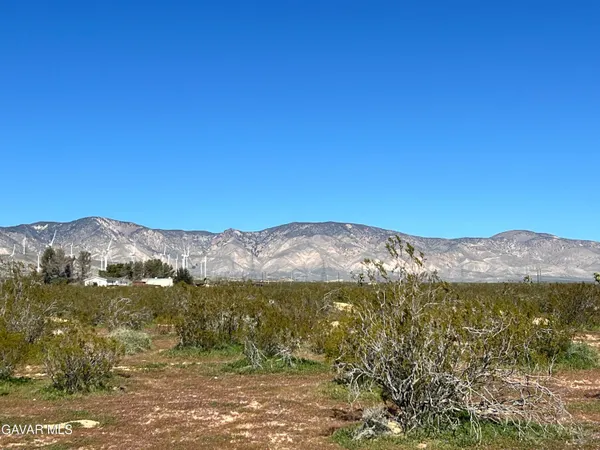 a view of a mountain with lake view