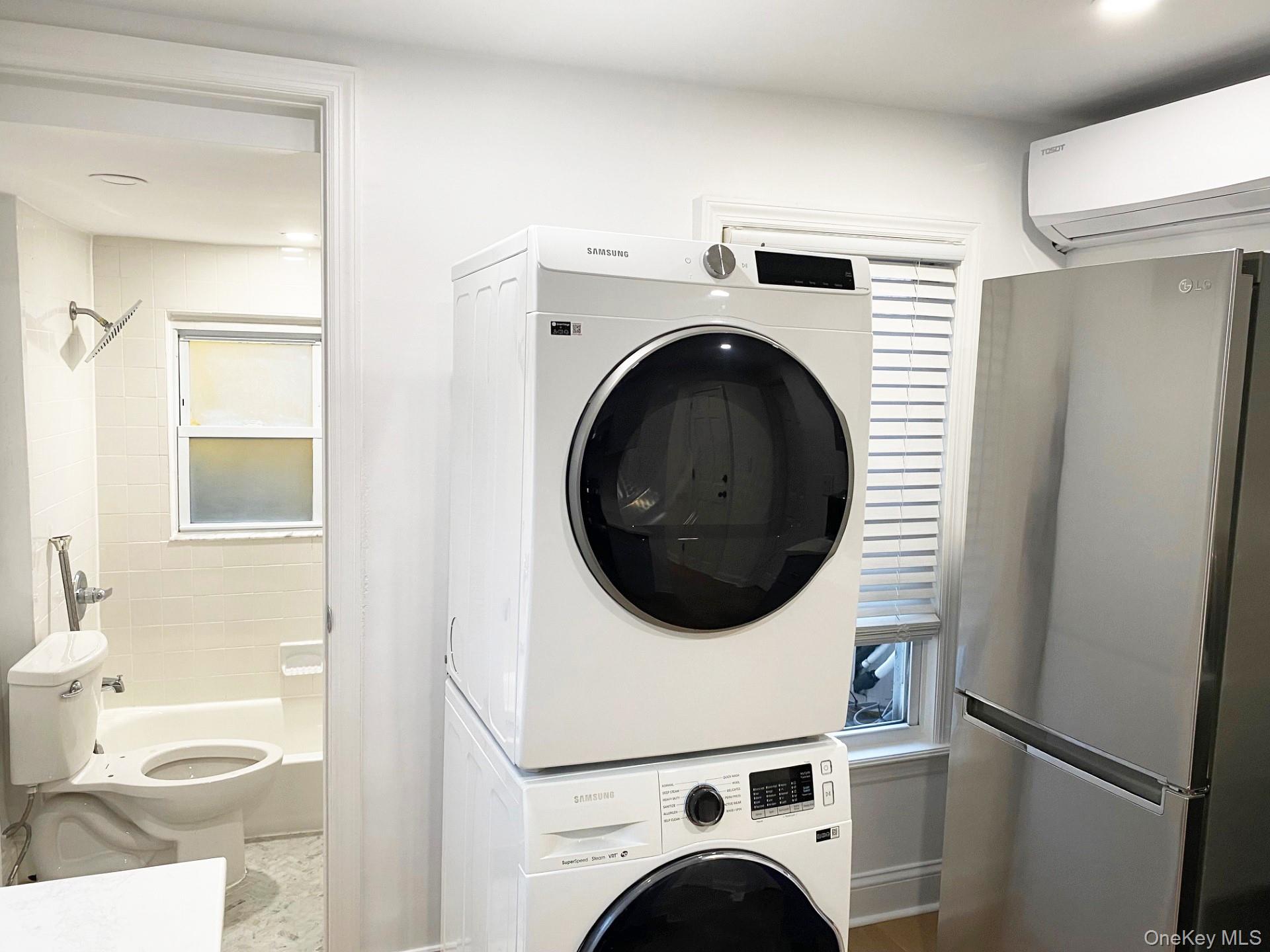 153 Southside Avenue Hastings-on-Hudson, NY 10706 - Photo 4 of 12 a utility room with dryer and washer