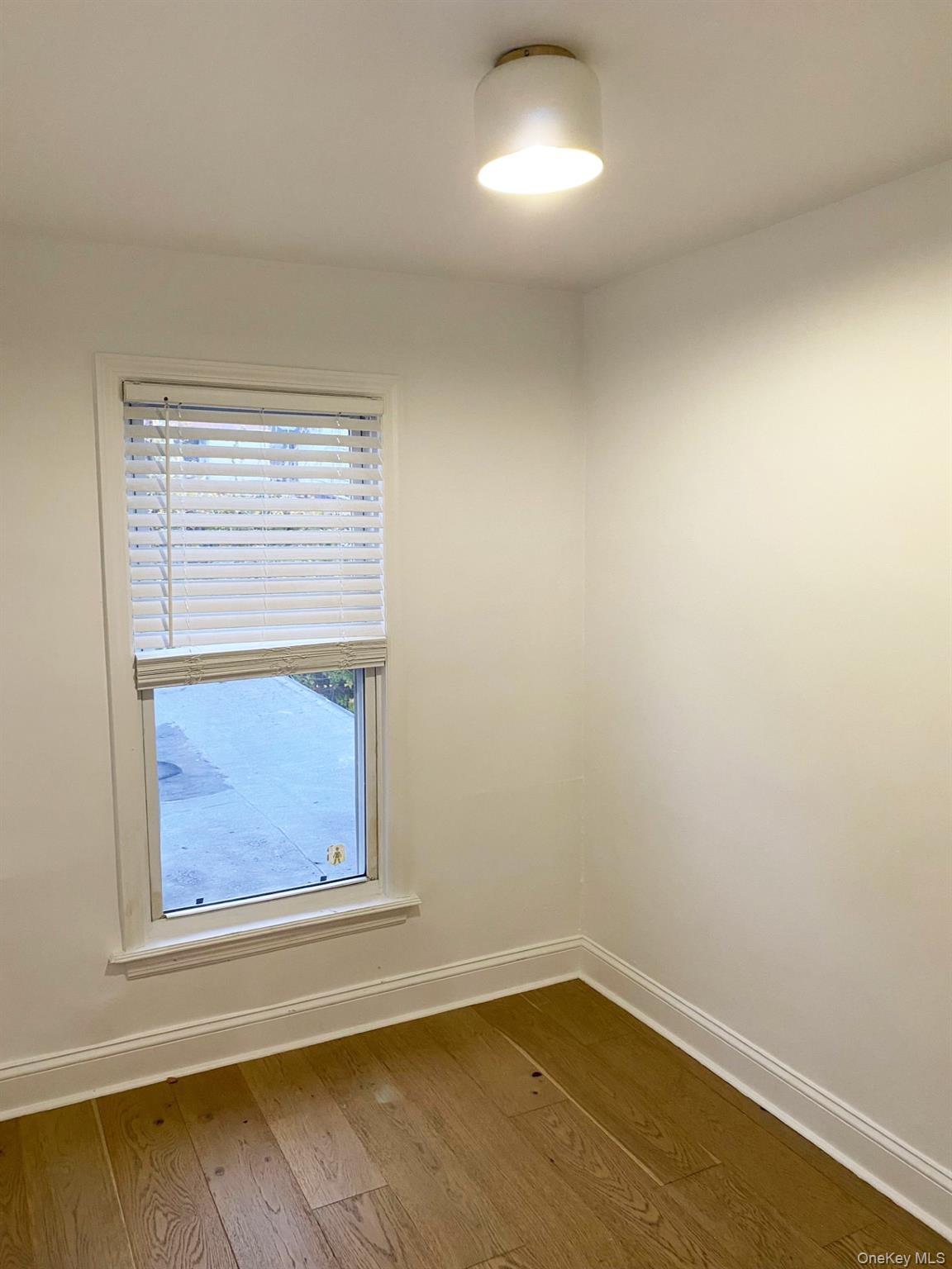 153 Southside Avenue Hastings-on-Hudson, NY 10706 - Photo 9 of 12 a view of a small space with a window