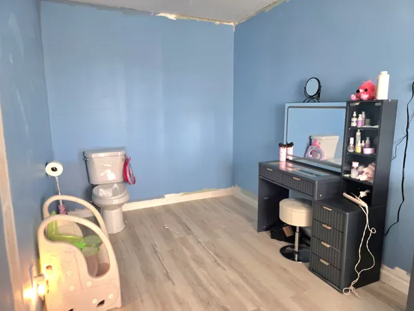 a workspace with furniture and window