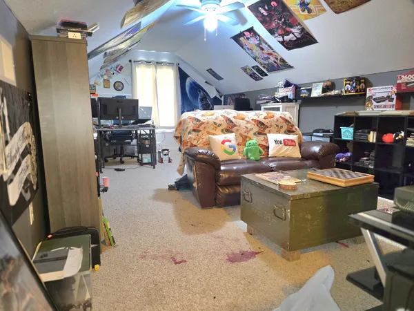 a view of backyard with a deck and wooden floor