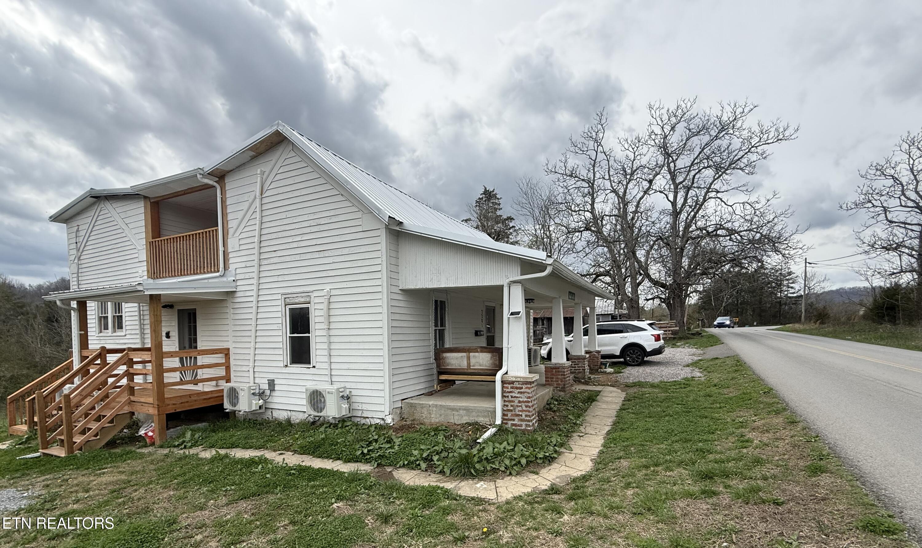 2281 Lone Mountain Road, Unit A Tazewell, TN 37879 - Photo 27 of 36 2281 Side house 3