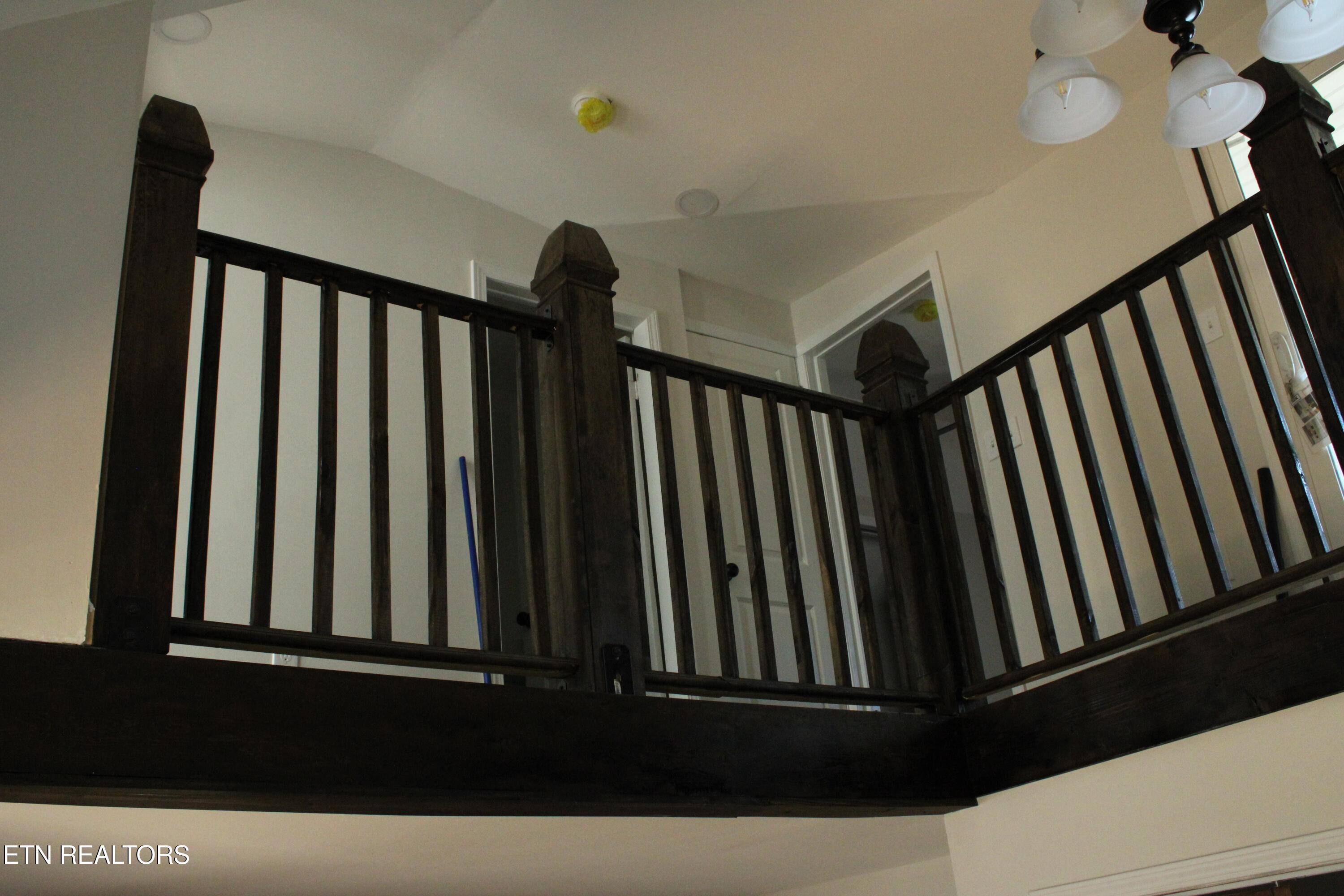 2281 Lone Mountain Road, Unit A Tazewell, TN 37879 - Photo 34 of 36 2281 Upstiars banisters