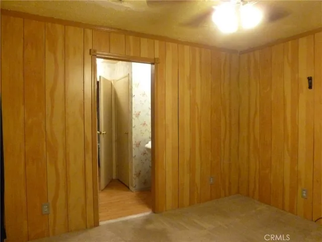 a view of a bathroom with shower and a window