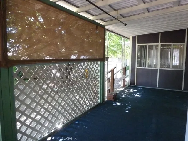 a view of entryway with a yard