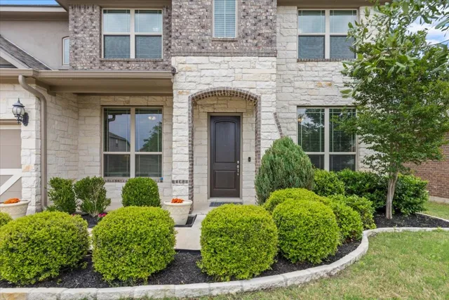 front view of a house with an window