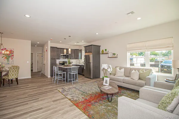 a living room with furniture and a table
