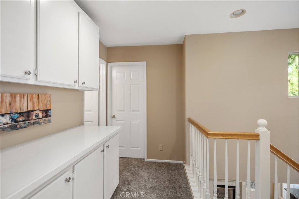38 Red Bud Aliso Viejo, CA 92656 - Photo 19 of 28 Upstairs linen closet and landing.