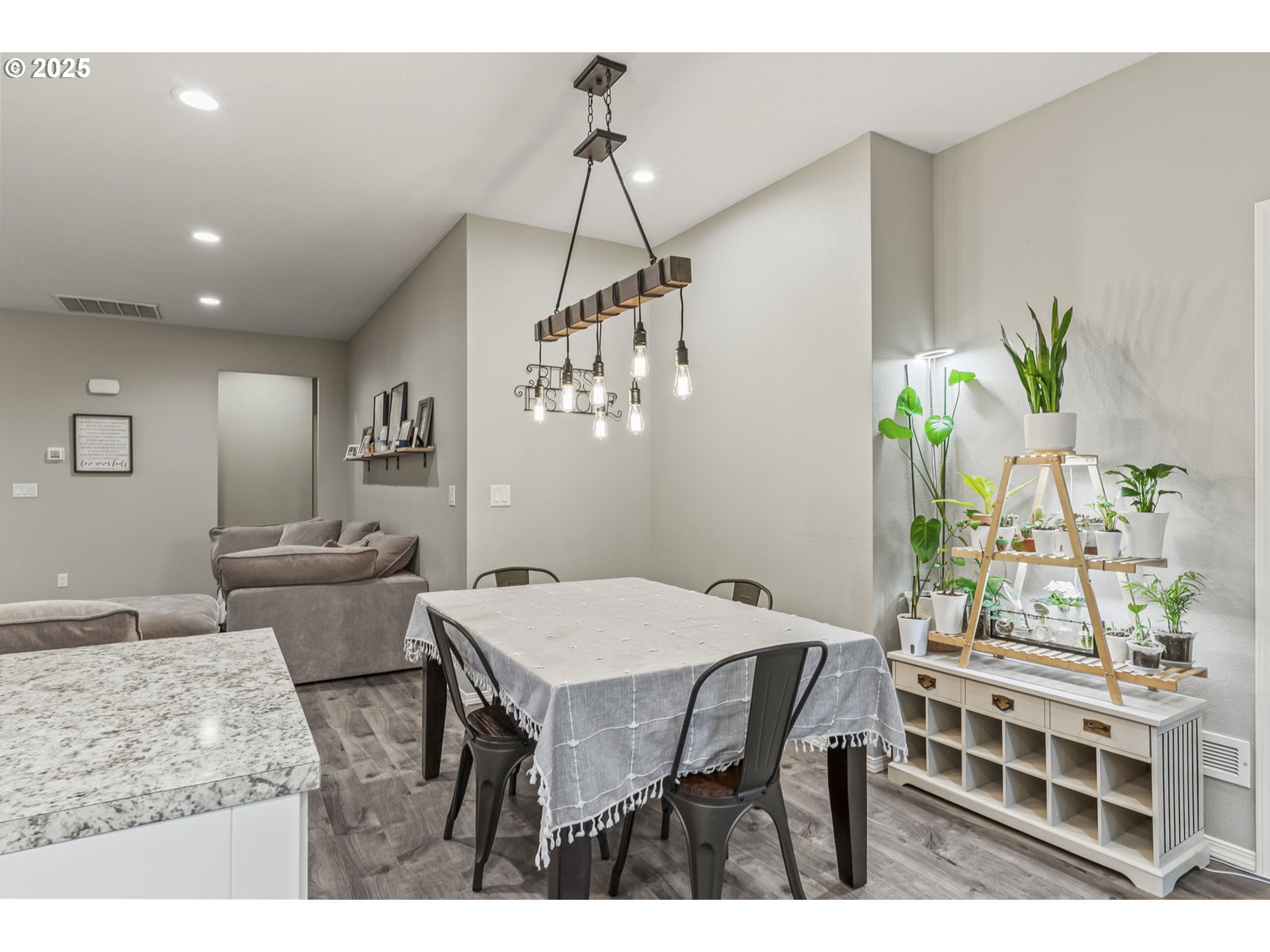 1783 Lewis River Road Woodland, WA 98674 - Photo 13 of 32 a view of a dining room with furniture and wooden floor