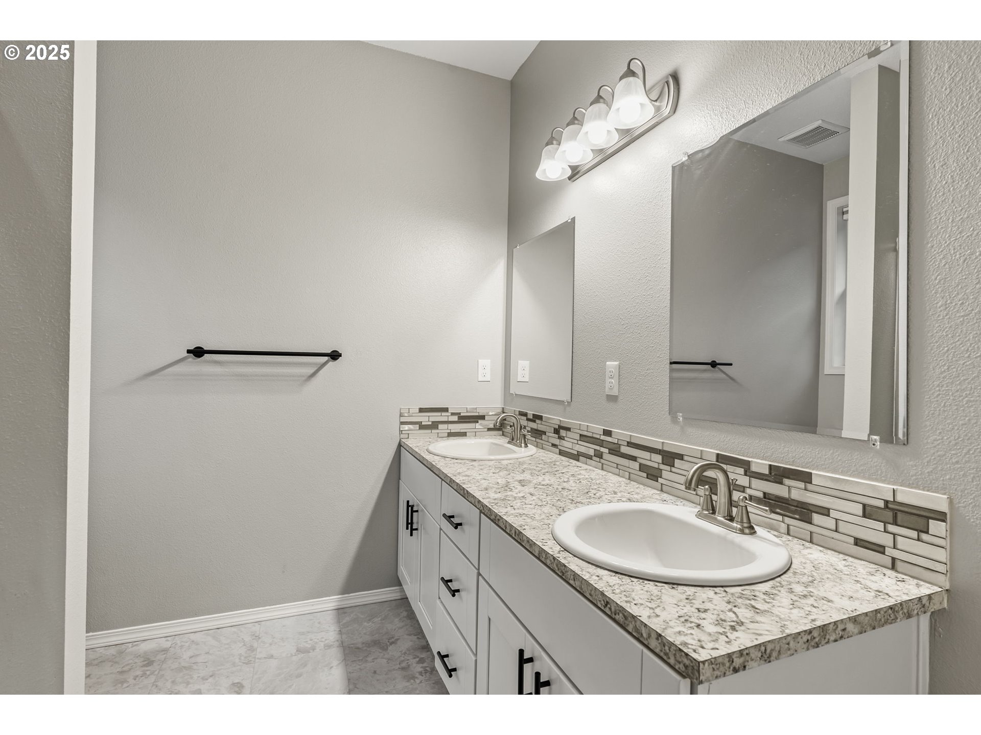 1783 Lewis River Road Woodland, WA 98674 - Photo 20 of 32 a bathroom with a sink and a mirror