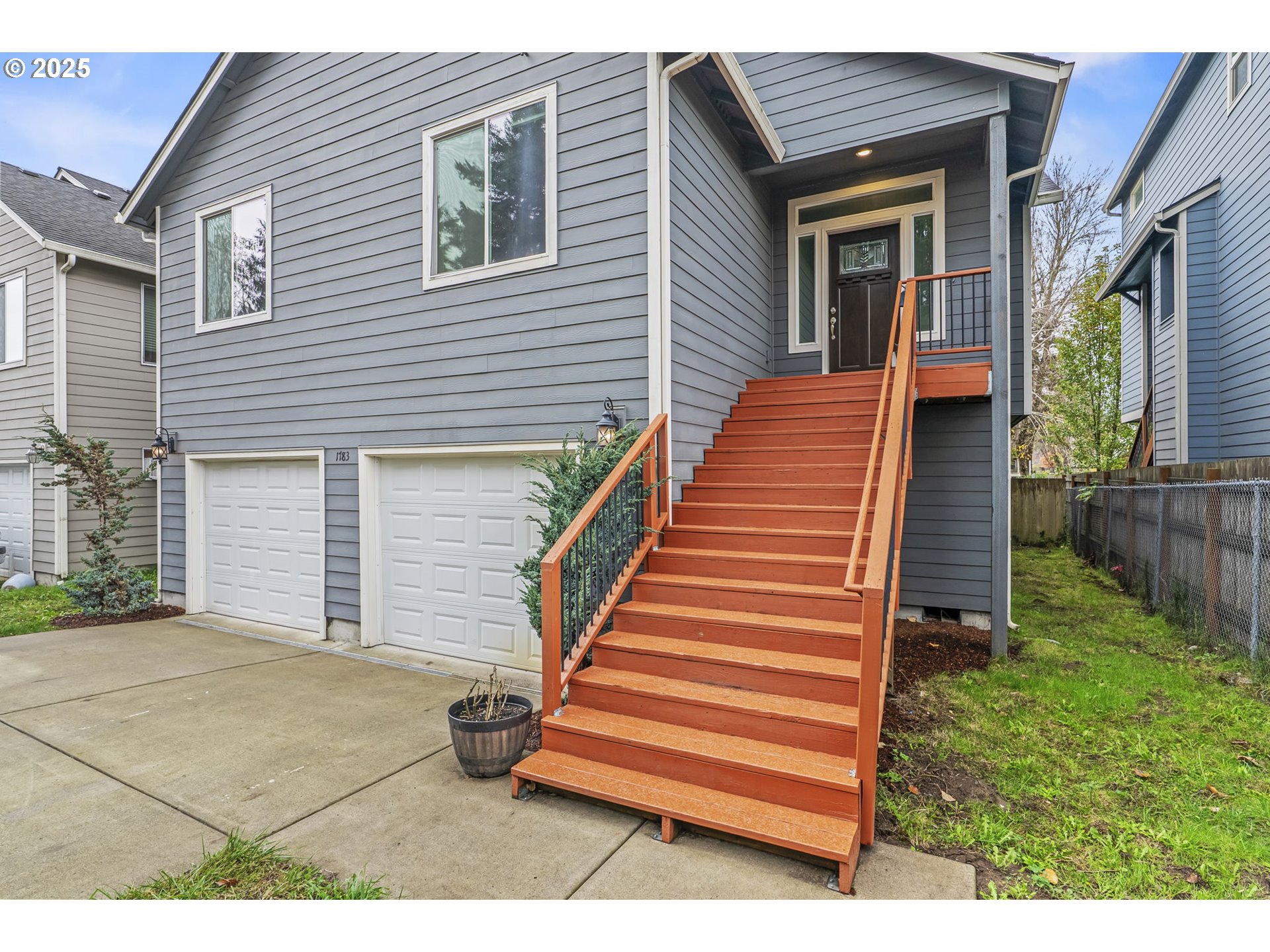 1783 Lewis River Road Woodland, WA 98674 - Photo 2 of 32 a front view of a house with a garden