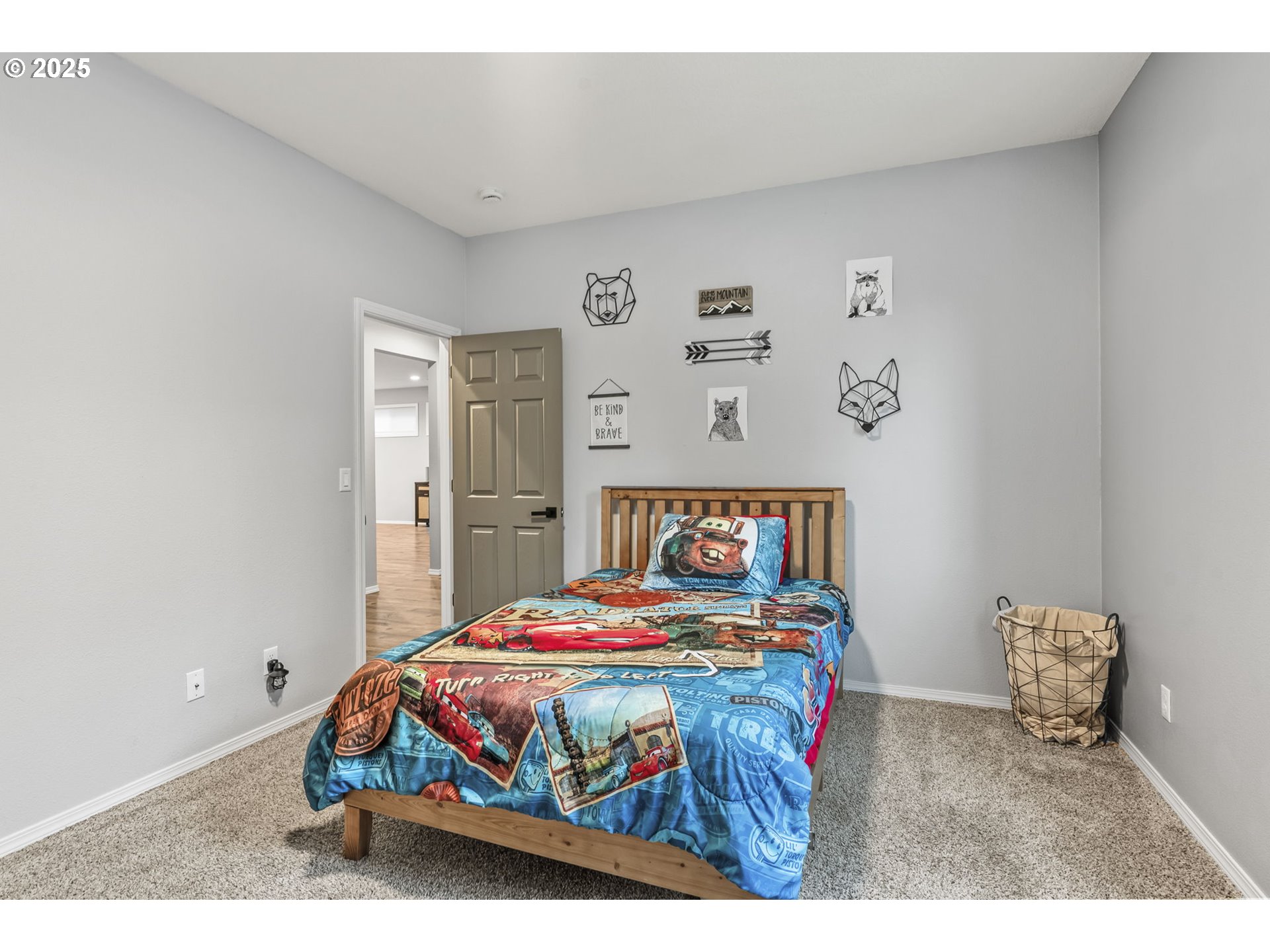 1783 Lewis River Road Woodland, WA 98674 - Photo 23 of 32 a bedroom with a bed and painting on the wall