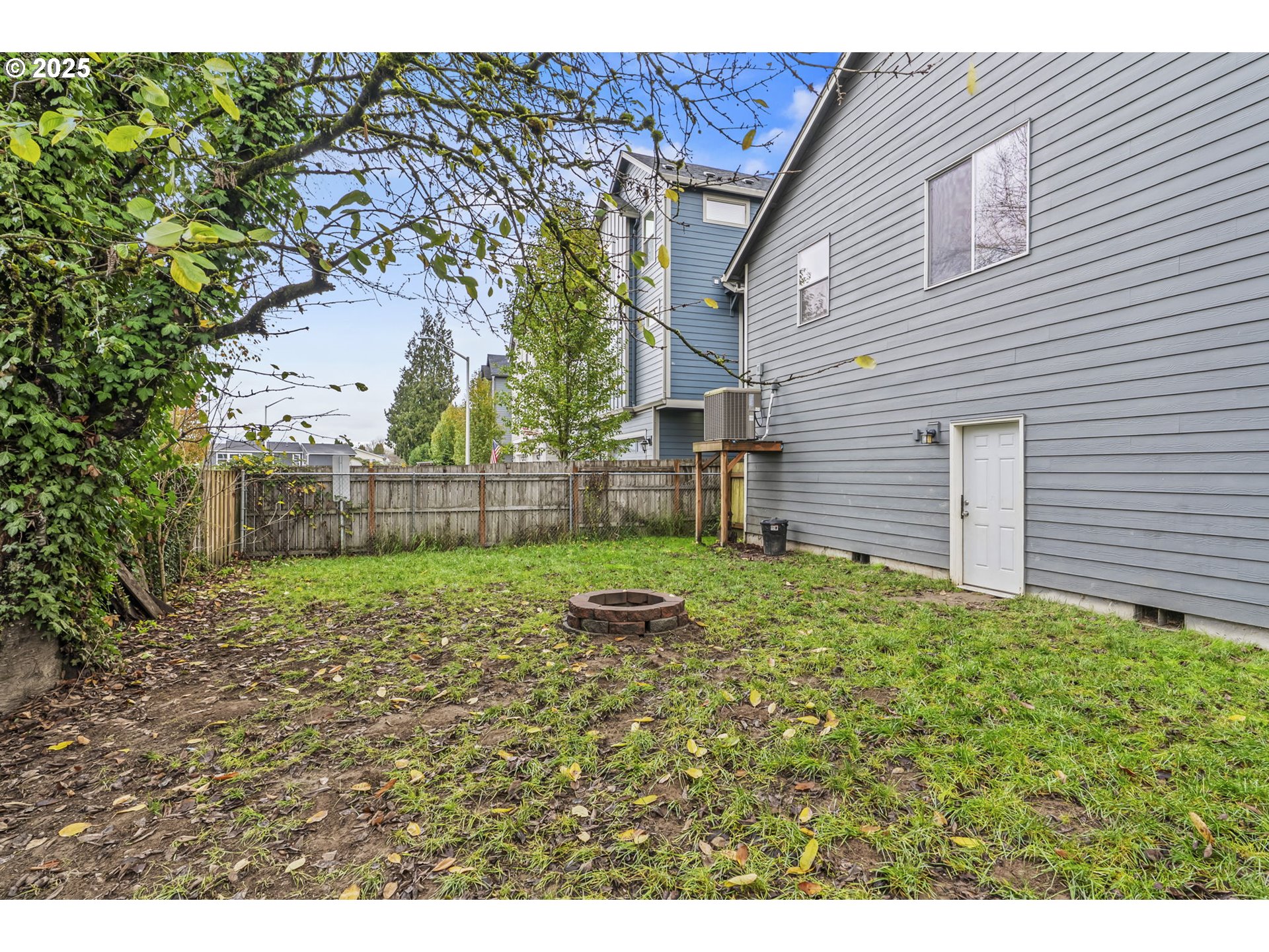 1783 Lewis River Road Woodland, WA 98674 - Photo 28 of 32 a backyard of a house with lots of green space