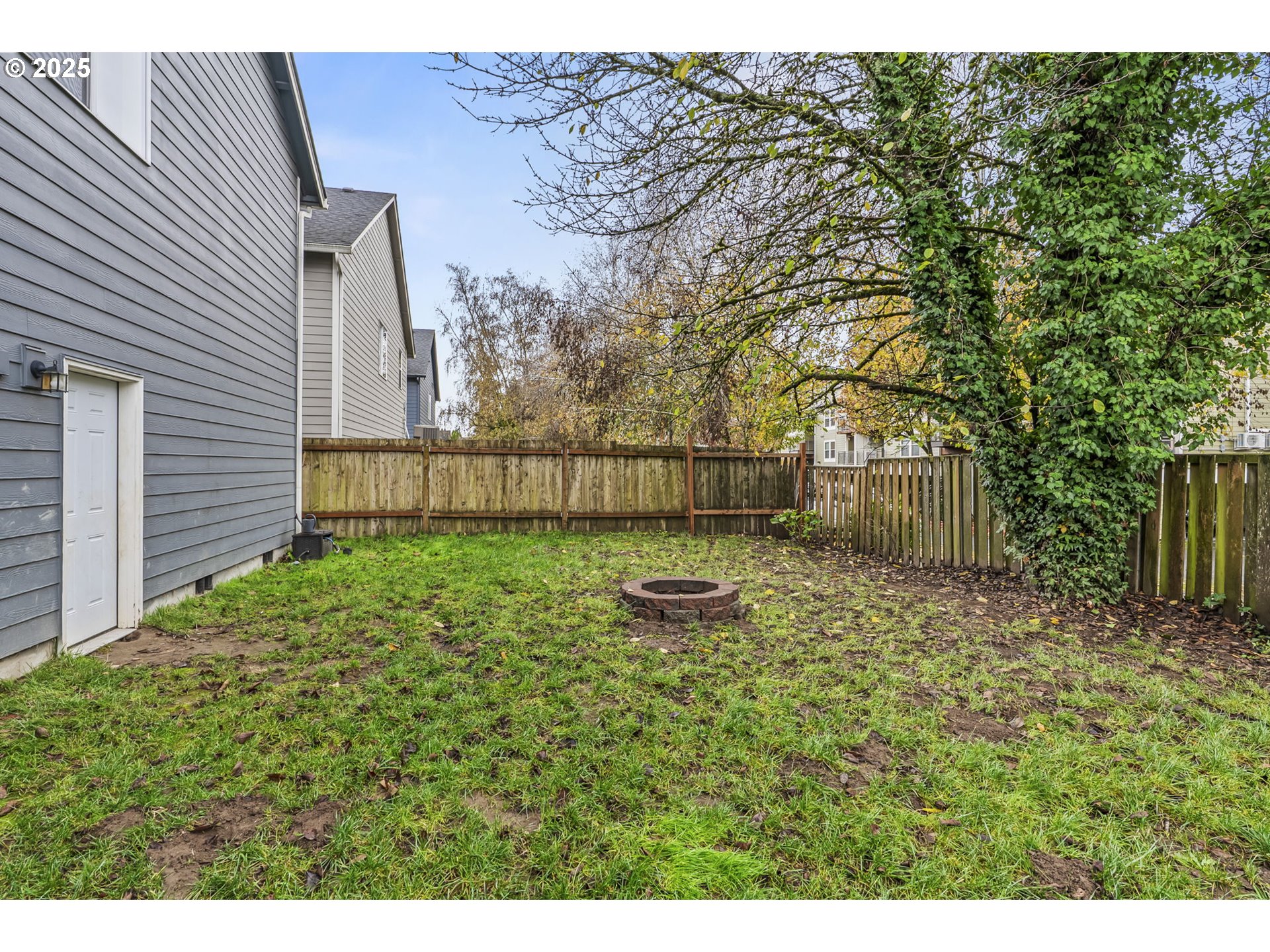 1783 Lewis River Road Woodland, WA 98674 - Photo 29 of 32 a backyard of a house with lots of green space