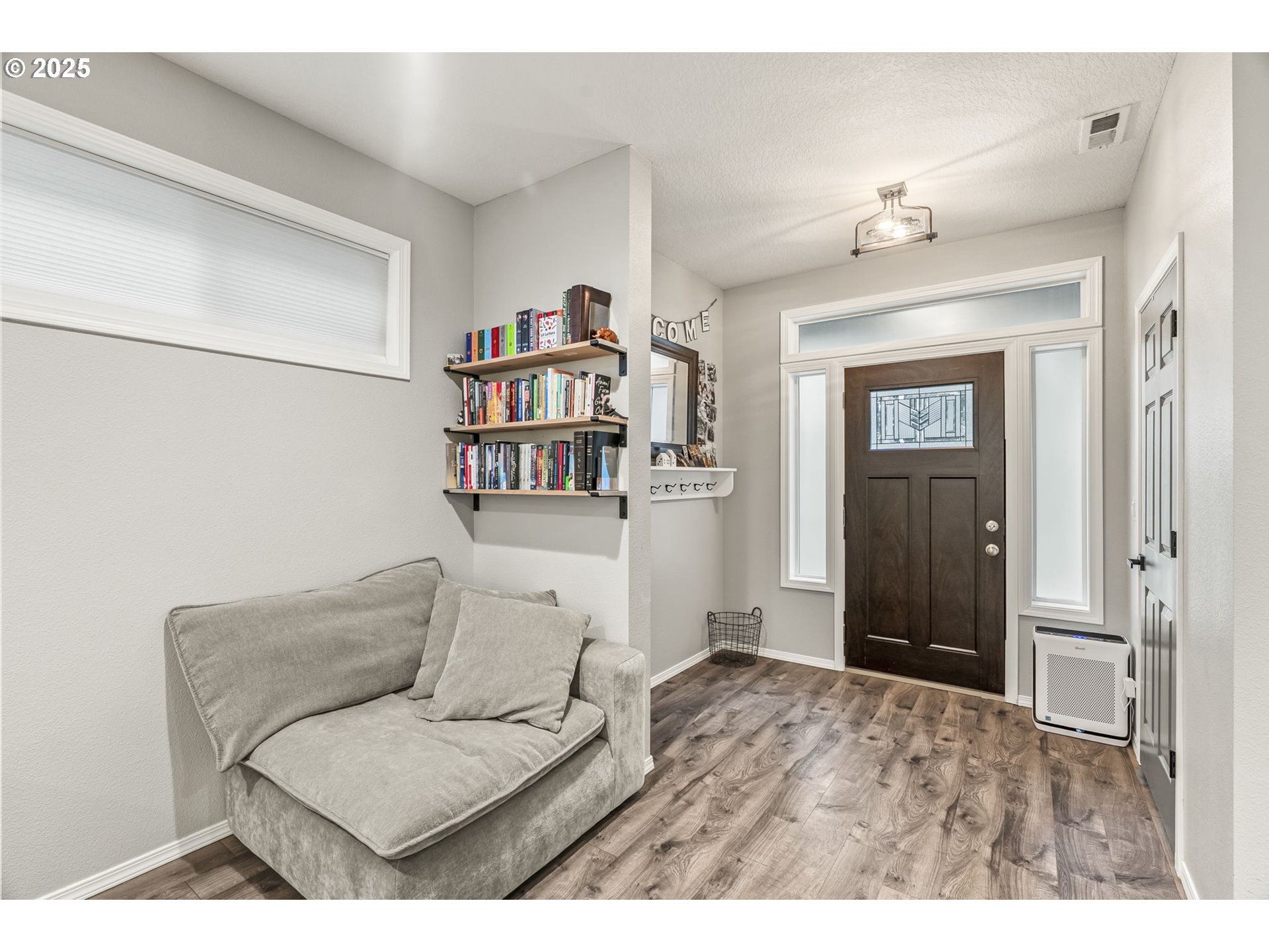1783 Lewis River Road Woodland, WA 98674 - Photo 4 of 32 a living room with furniture and a wooden floor