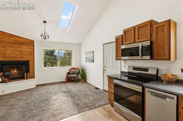a kitchen with a stove and a microwave