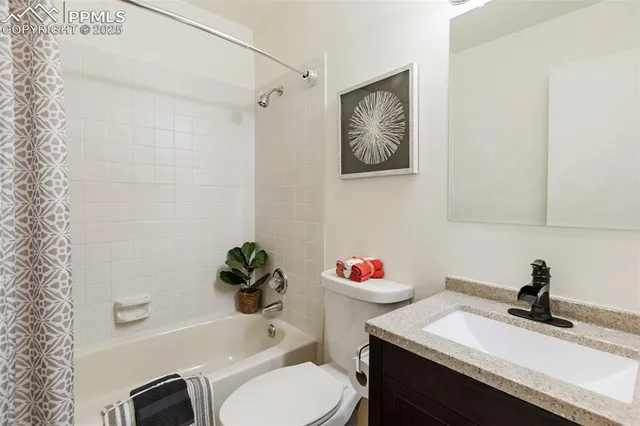 a bathroom with a sink toilet and a bathtub