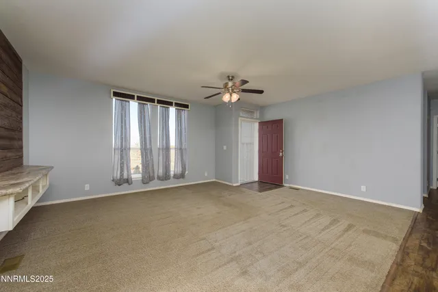 a large kitchen with kitchen island a sink stainless steel appliances and cabinets